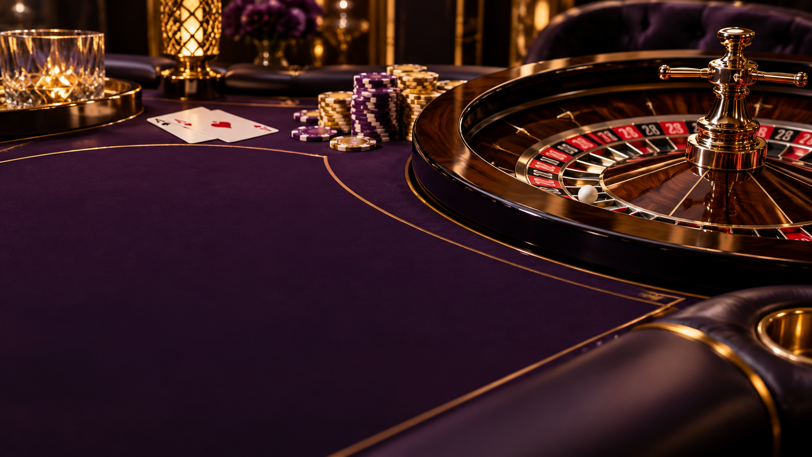 Roulette wheel and casino chips on a purple felt table.